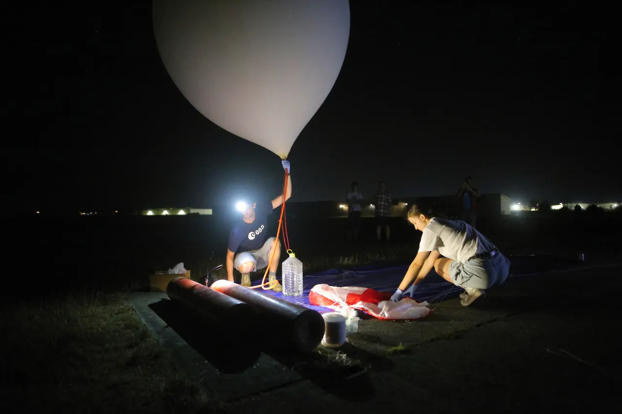 Night launch preparations for a specialized balloon mission